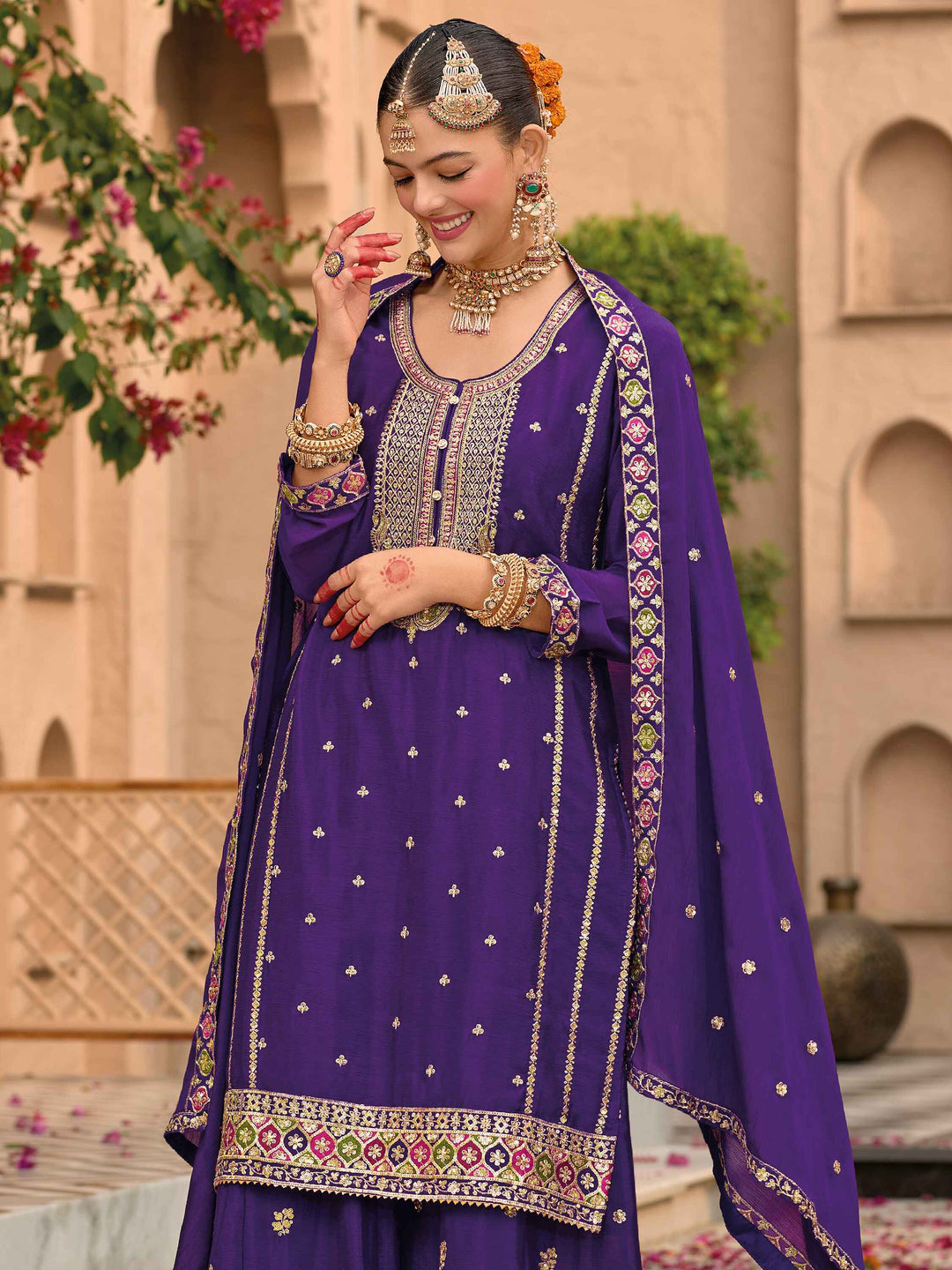  Lavish purple palazzo with intricate embroidery on both sides 