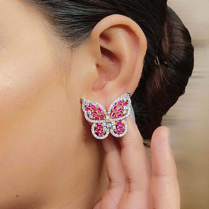 Gold plated tops with vibrant magenta diamond work, perfect for any occasion