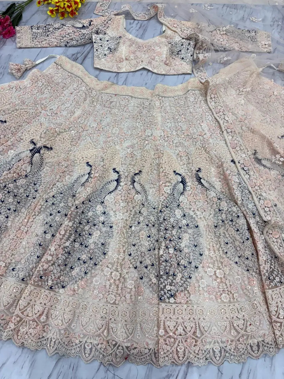 Light Peach Soft Net Lehenga With Multi Thread Sandwich Sequins Embroidery Work - qivii