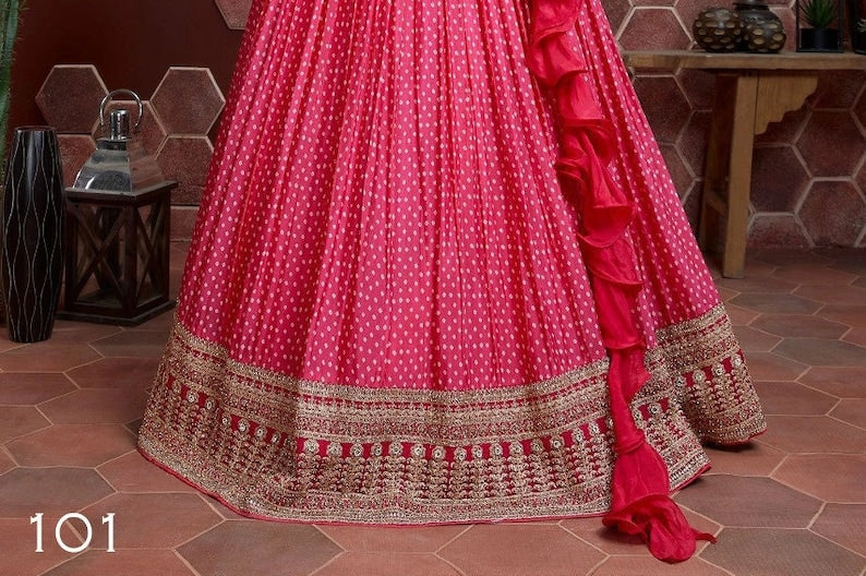 Beautiful pink lehenga choli with intricate embroidery, perfect for weddings and parties