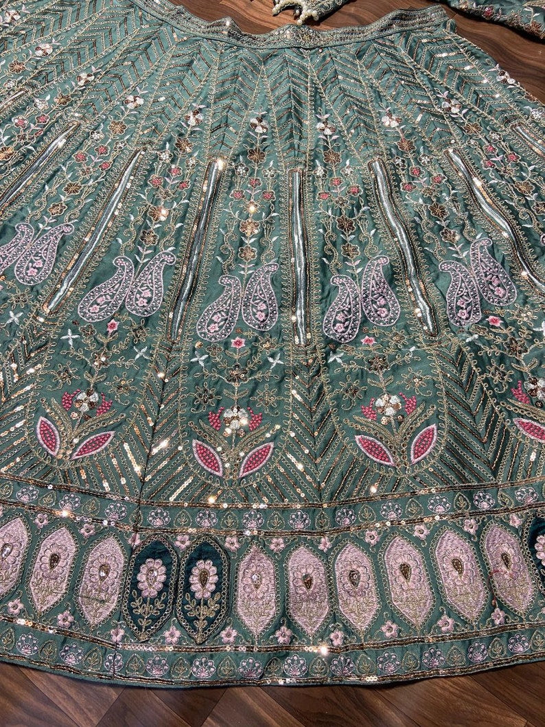 Exquisite Wedding Lehenga Choli with Intricate Embroidery and Stunning Color