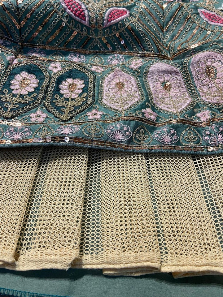 Beautiful red and gold designer lehenga choli with intricate embroidery details