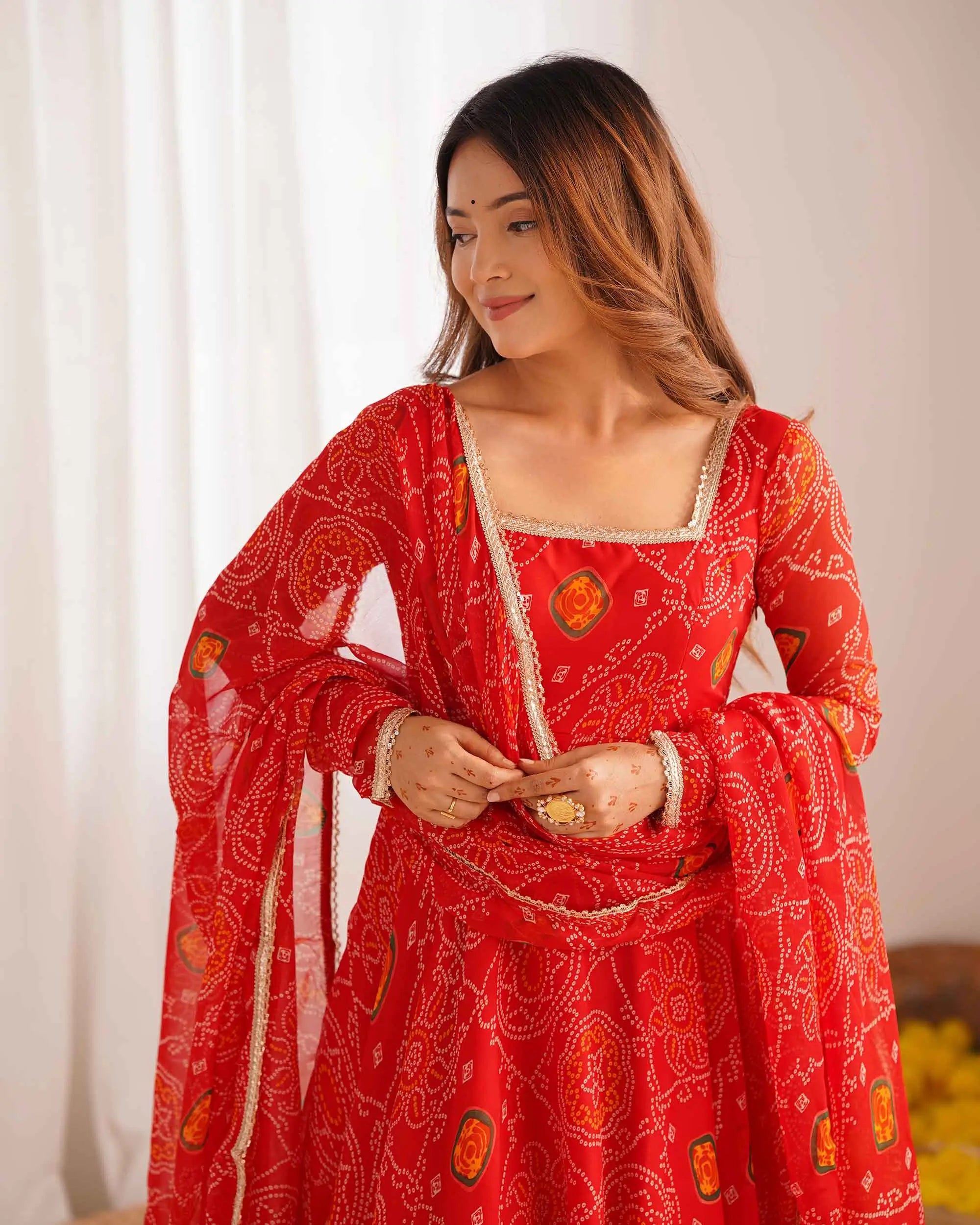 Ruby Red Soft Light Weight Chiffon Bandhej Print Gown With Dupatta
