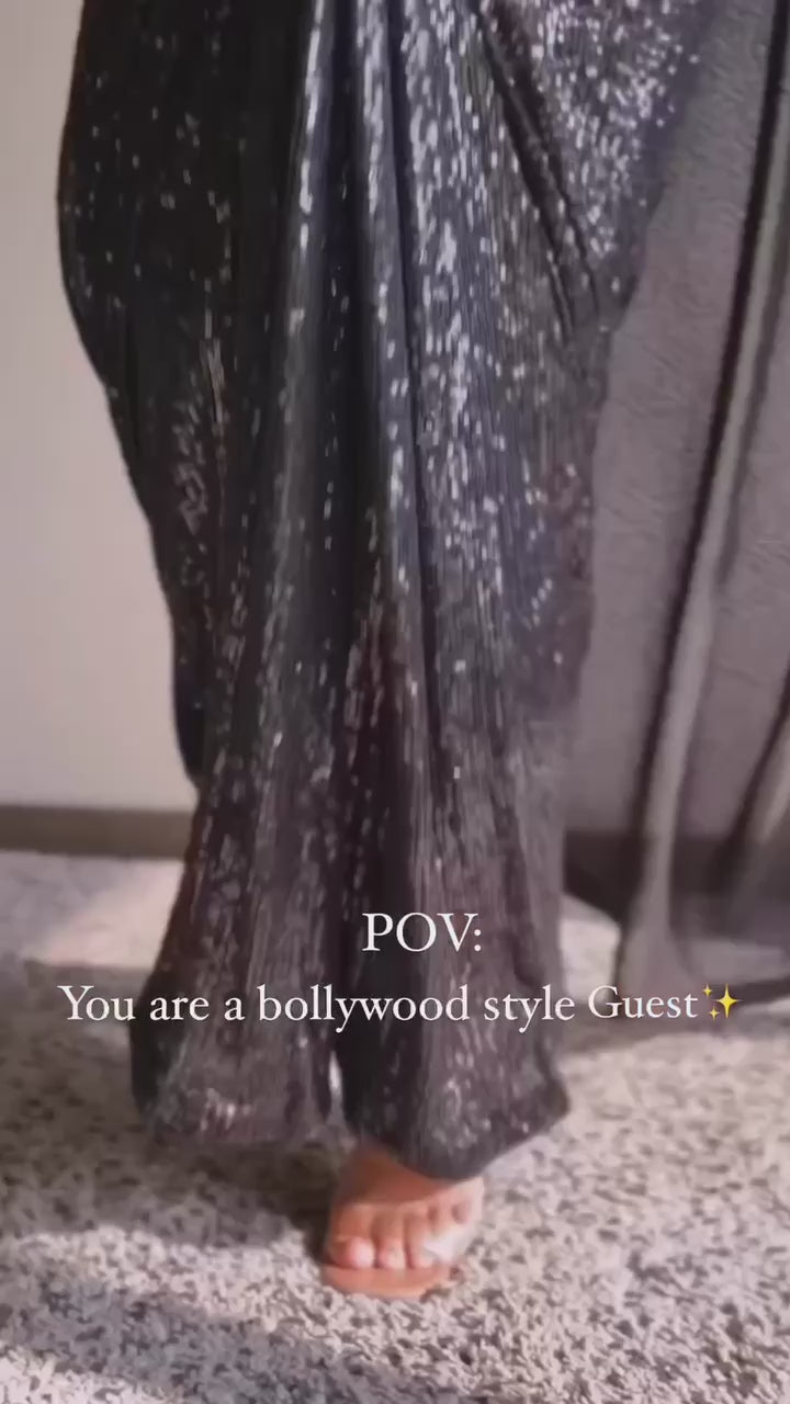 Black Georget saree with sequnece work + piping border